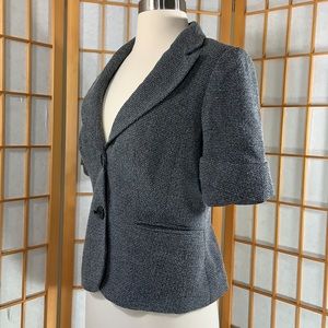 The Limited short sleeve blazer. Black and white pattern with two buttons.